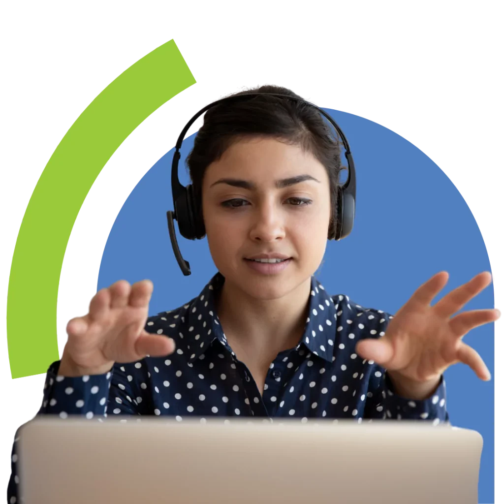 Woman with headset using laptop