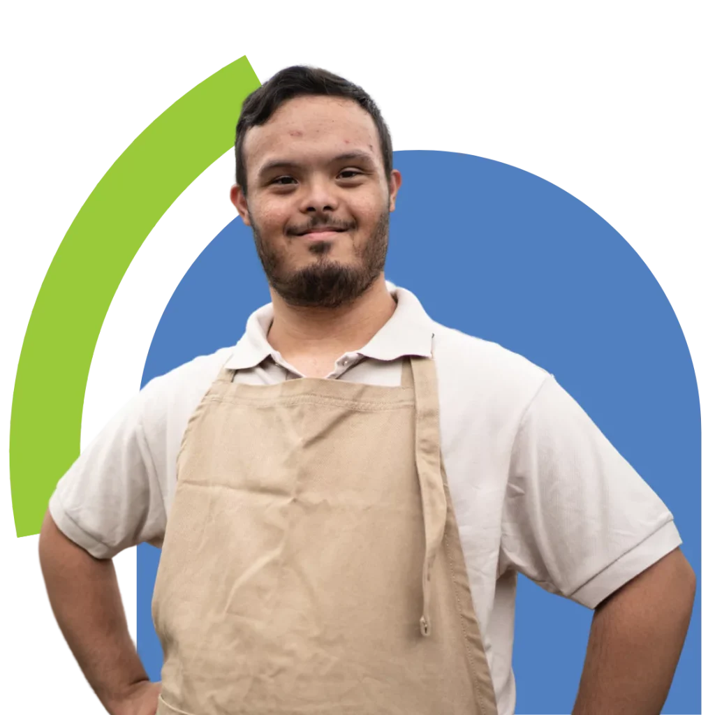 Disabled man with down syndrome smiling at camera