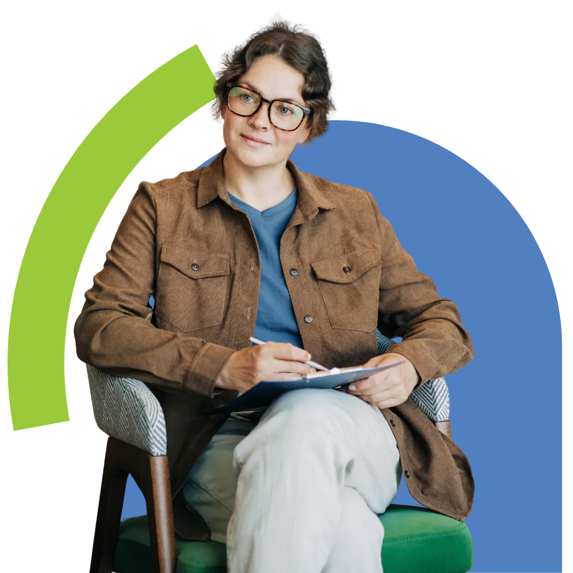 Counsellor sitting in chair taking notes