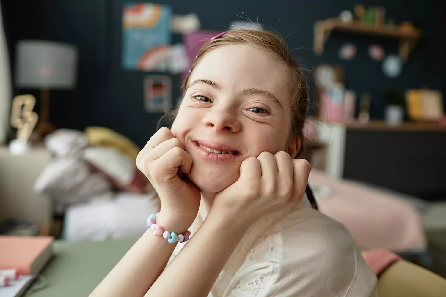 Happy disabled girl smiling at camera